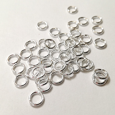 7MM SILVER ROUND RINGS, BAG OF 100